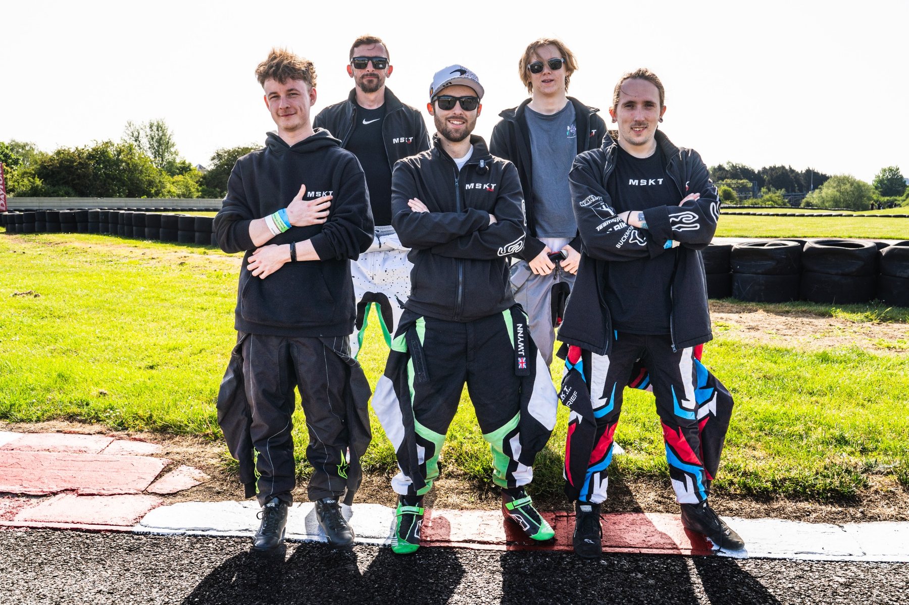 MSKT team members at the track