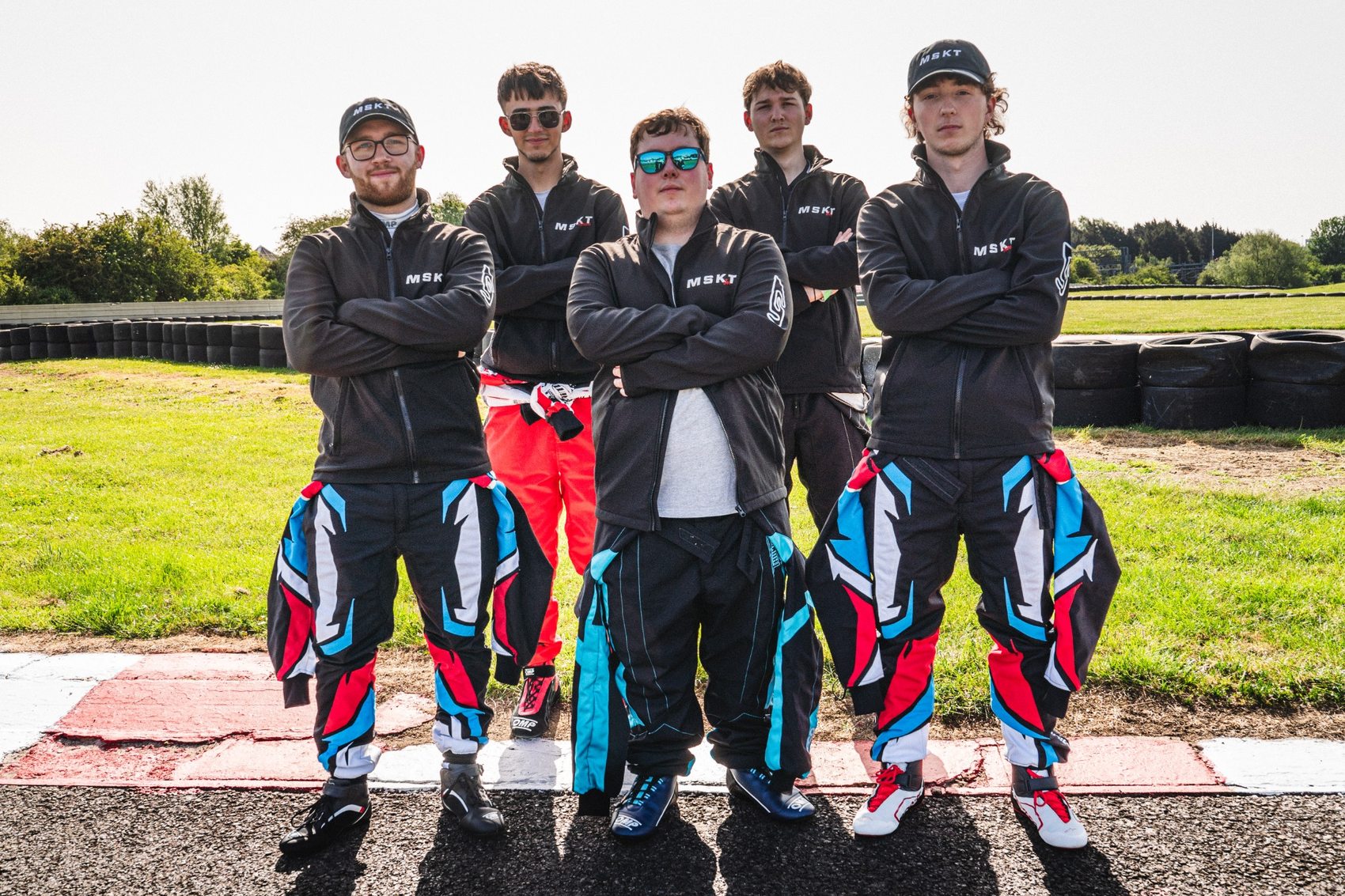 Drivers receiving a karting briefing